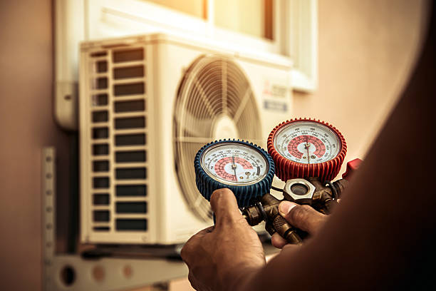 Professional Air Conditioning Service technician working in South Harwich, MA